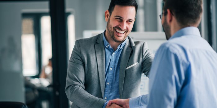 Portrait,Of,Cheerful,Young,Manager,Handshake,With,New,Employee. Portrait,Of,Cheerful,Young,Manager,Handshake,With,New,Employee.